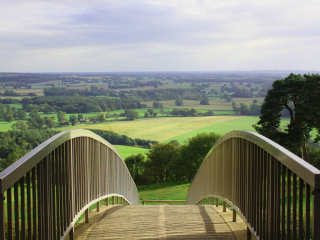 View from Beeston Castle View over a pedestrian bridge at Beeston Castle of farmland